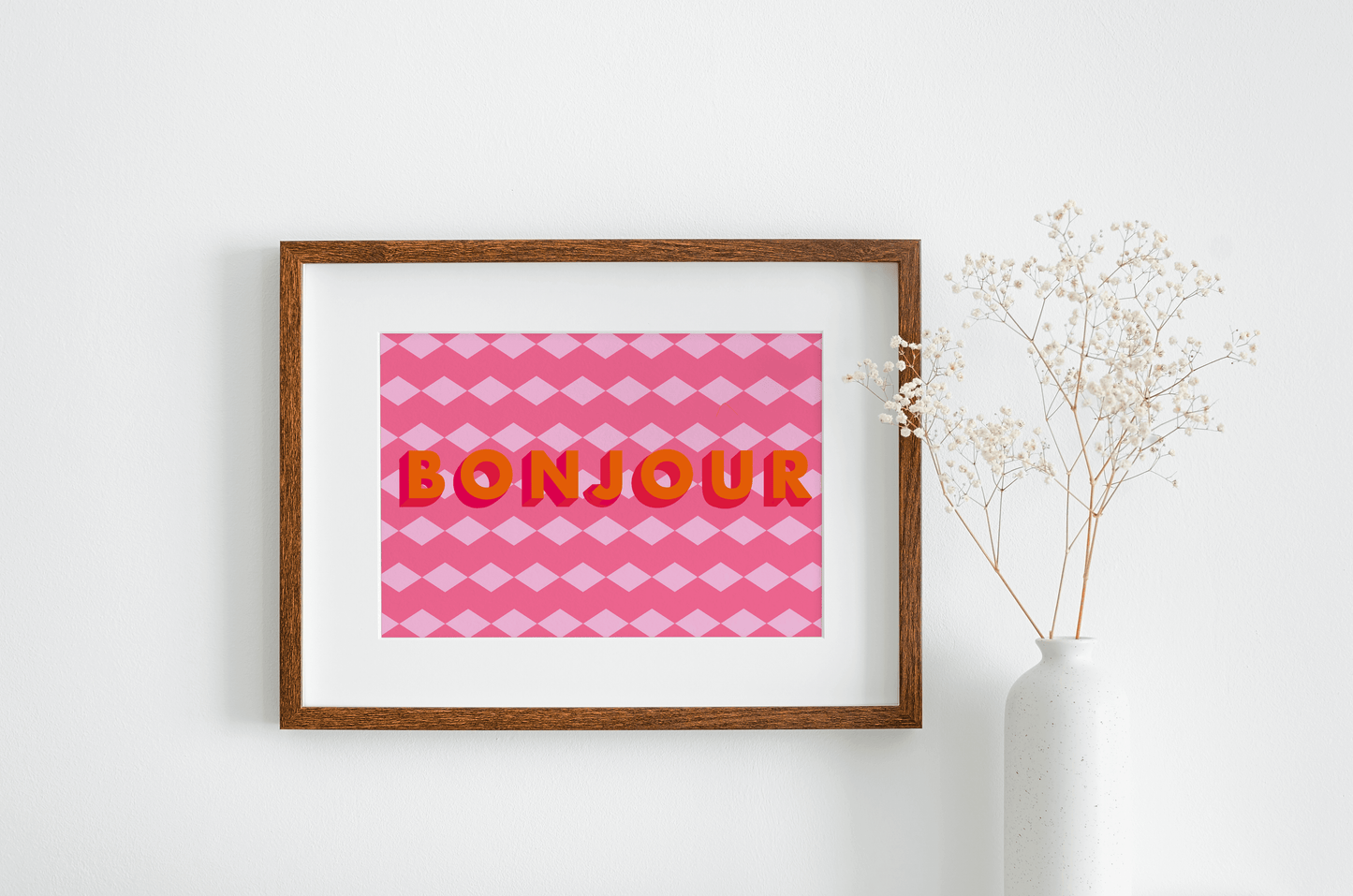 Bonjour pink and orange text on a pink geometric background art print