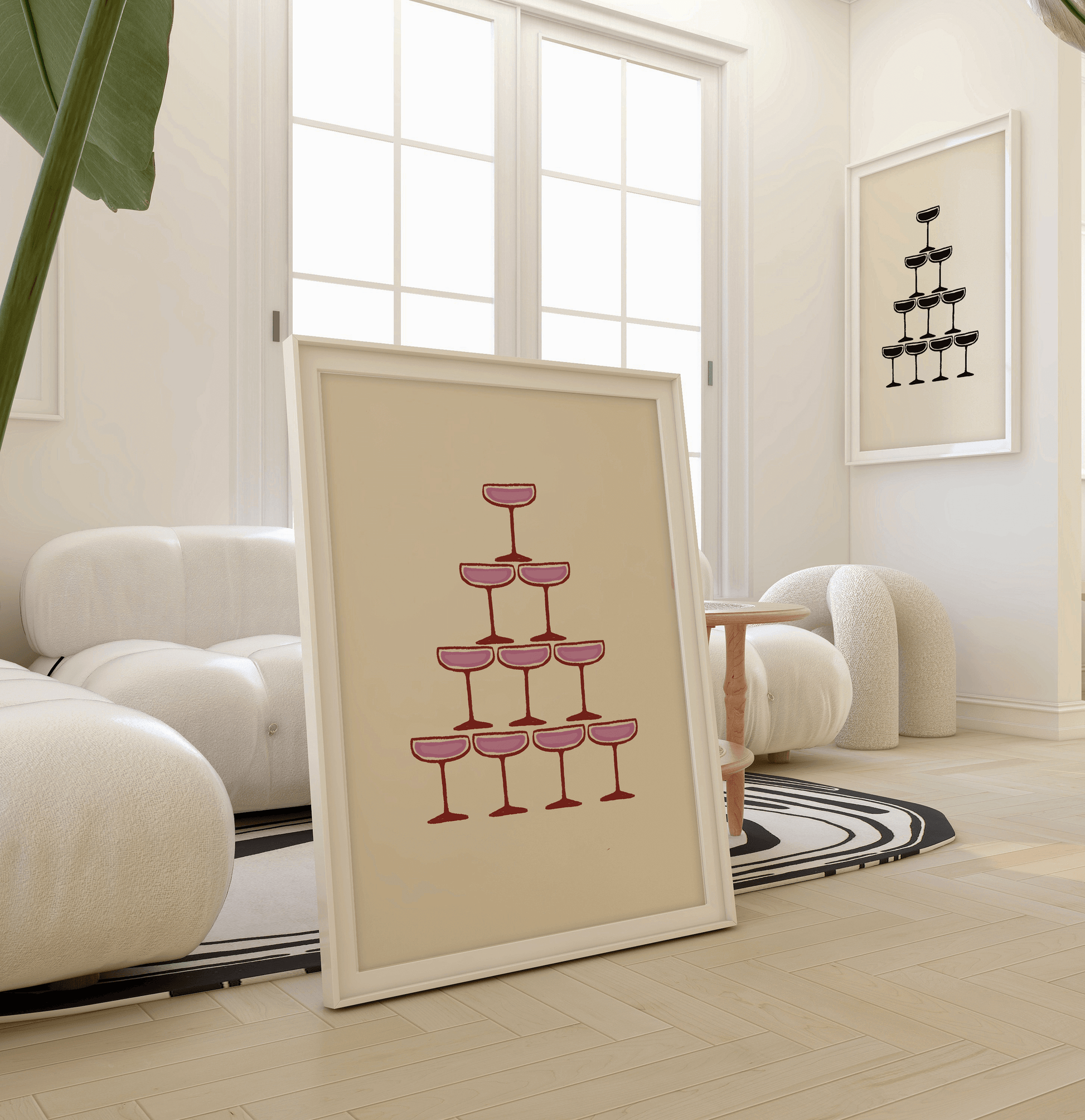 Pink illustration of champagne coupe's forming a champagne fountain, in a leaning frame with neutral decor